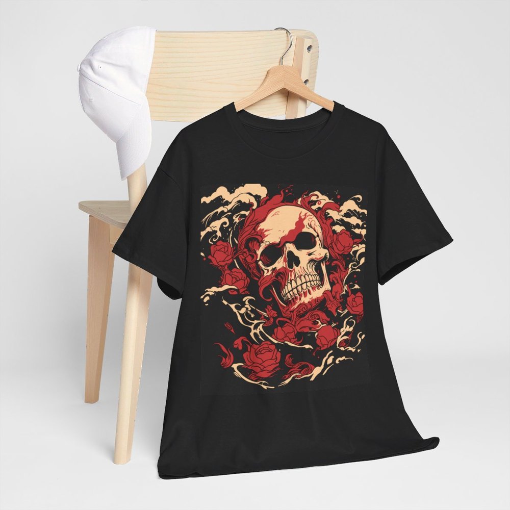 A black t-shirt printed with an illustrated skull surrounded by red roses, on a hanger