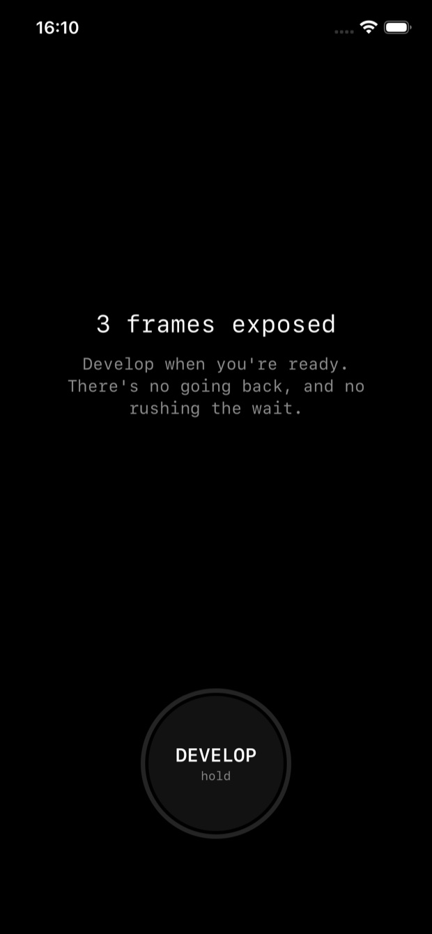 SLOSTA develop screen — 'frames exposed. Develop when you're ready. There's no going back, and no rushing the wait,' with a hold-to-develop button